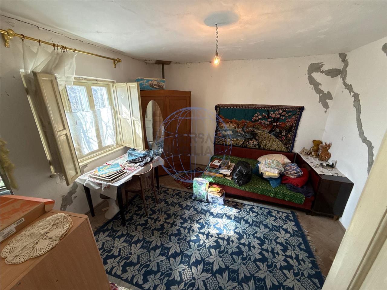 CASA CARAMIDA 5 CAMERE SI 5588MP INTRAVILAN , DESCHIDERE LA 2 STRAZI